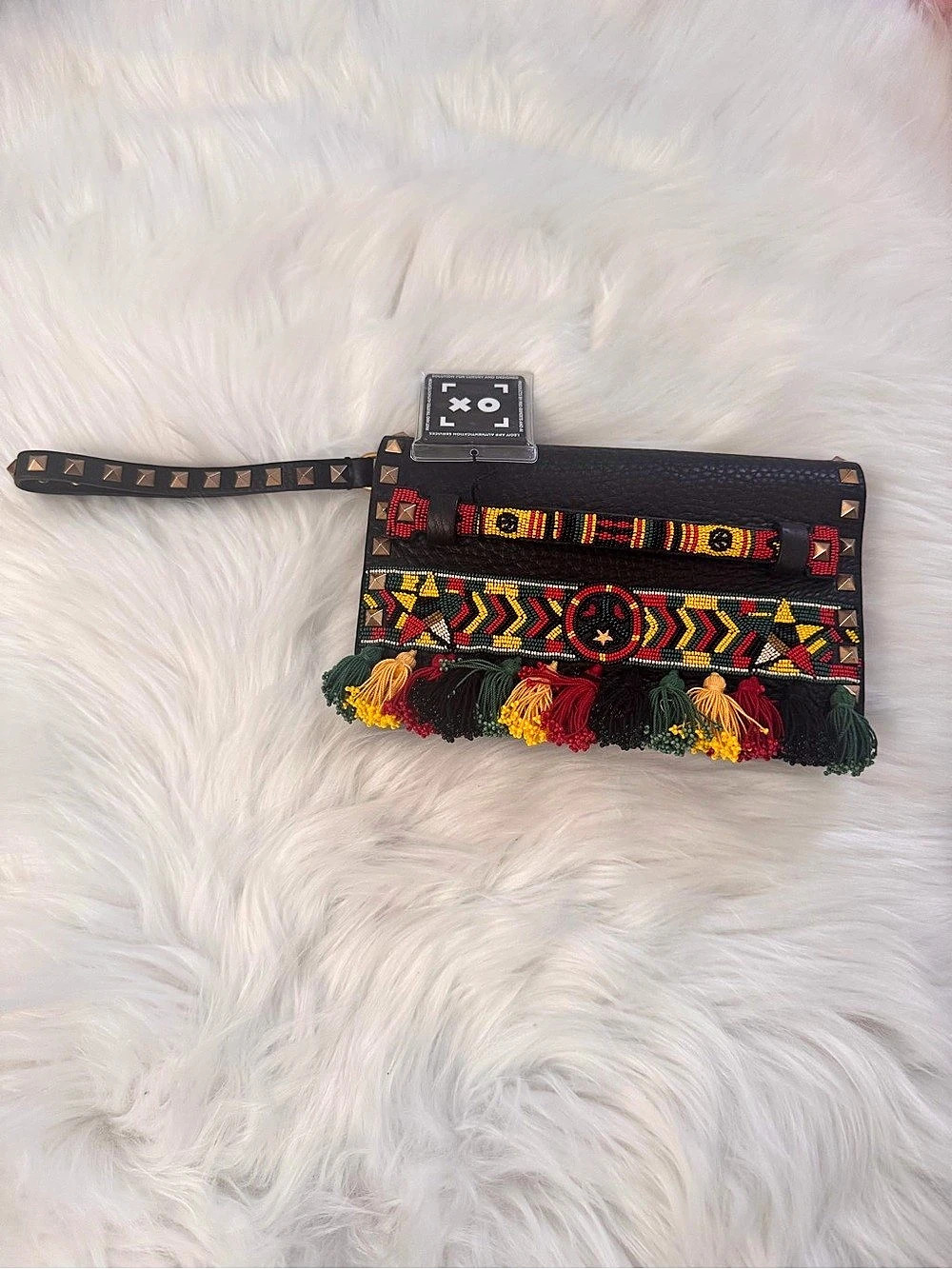 Valentino Garavani Geometric Star Embroidered Studded Tassel Leather Wristlet